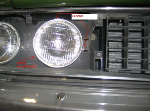 1970 Ford Ranchero - Close-up view of a vehicle's headlight and grille assembly, with annotations indicating mounting points.