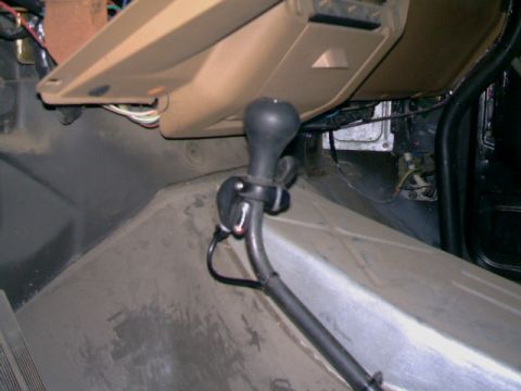 1989 Ford Bronco - Close-up of the hand throttle mechanism inside a 1989 Ford Bronco.