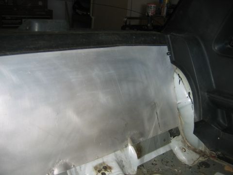 1992 Ford Mustang - Close-up view of an interior panel, likely from a Ford Mustang, showing a brushed metal finish.