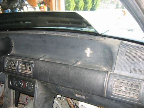 1992 Ford Mustang - Interior view of a 1992 Ford Mustang dashboard with visible air vents and climate controls.