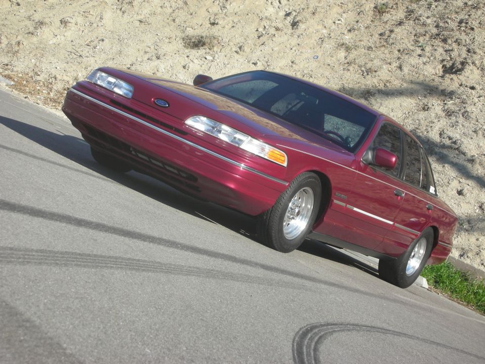 Red 1992 Ford Crown Victoria, 3q-front view