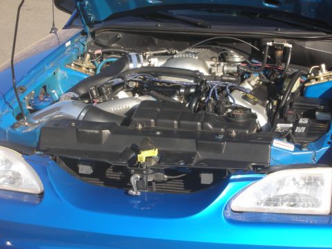 1992 Ford Crown Victoria - Engine bay of a 1996 Ford Mustang Cobra, showing the 4.6L V8 engine and aftermarket intake.