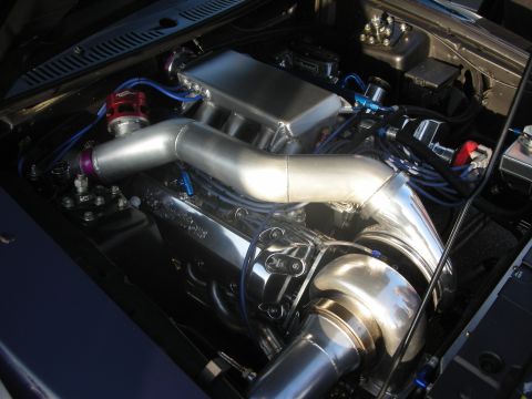 1998 Ford Crown Victoria - Custom V8 engine bay with polished intake and turbocharger components.