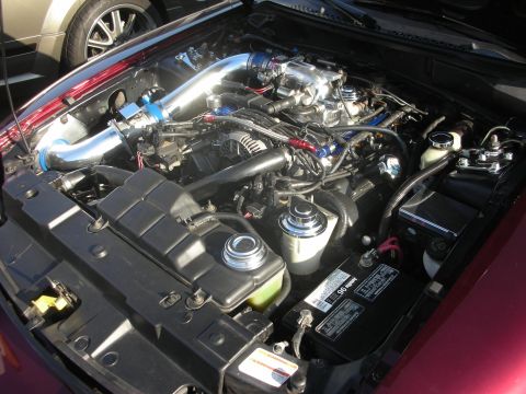 1998 Ford Crown Victoria - Engine bay details with aftermarket modifications visible.