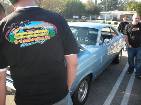1998 Ford Crown Victoria - Light blue coupe with chrome trim and aftermarket wheels is parked on asphalt.