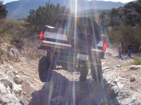 1989 Ford Bronco - This 1989 Ford Bronco navigates a challenging rocky trail, its off-road capabilities.