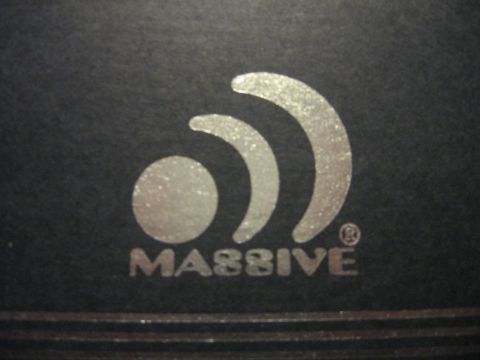 1992 Ford Crown Victoria - Close-up of the 'Massive' audio logo, indicating a car audio component.