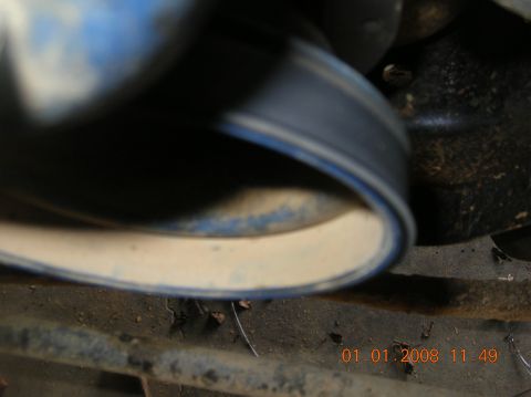 1991 Ford F-150 - Not real clear, but you can see where the belt has jumped a groove to the outside on the crank pulley