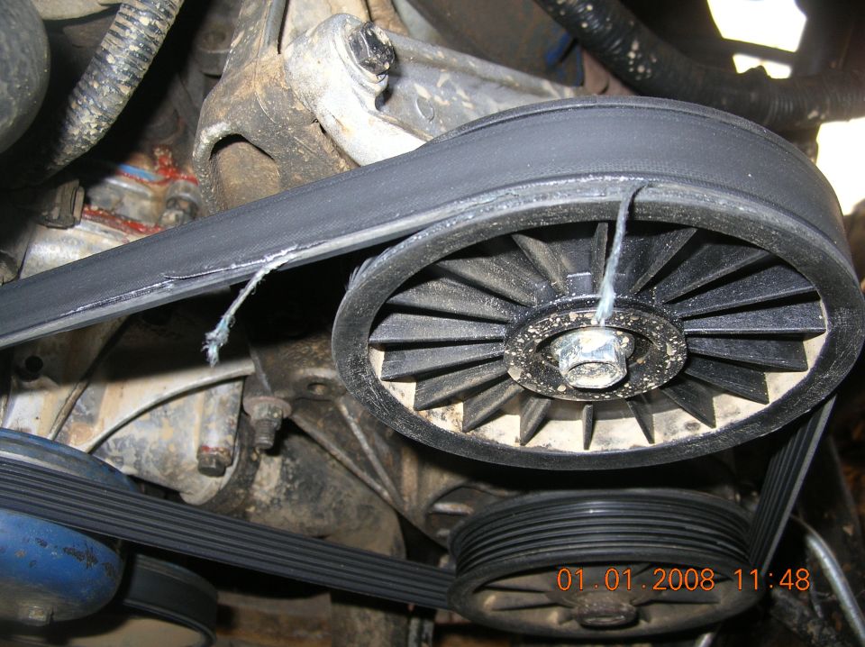 And here you see where the belt is being ripped apart. I didn't catch this until I was out playing around on a trail. I guess I was too busy making sure my new PS pump and all the gaskets/seals I had replaced weren't leaking. I don't know what could cause this other than the Sag pump needs shimmed or something???