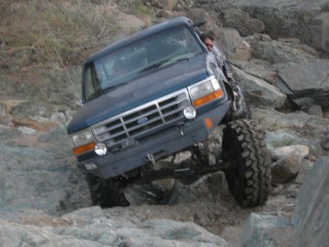 1974 Ford F-250 - This Ford Bronco is navigating a rocky off-road course.