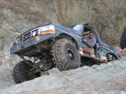 1974 Ford F-250 - This heavily modified 1992 Ford F-150 navigates a challenging rocky trail.