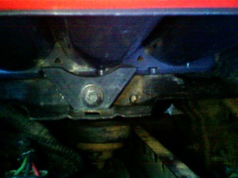1992 Ford F-150 - The provisions for the hold down clamp on the new red top are traingle shaped, unlike the older batteries, which have rectangular holes