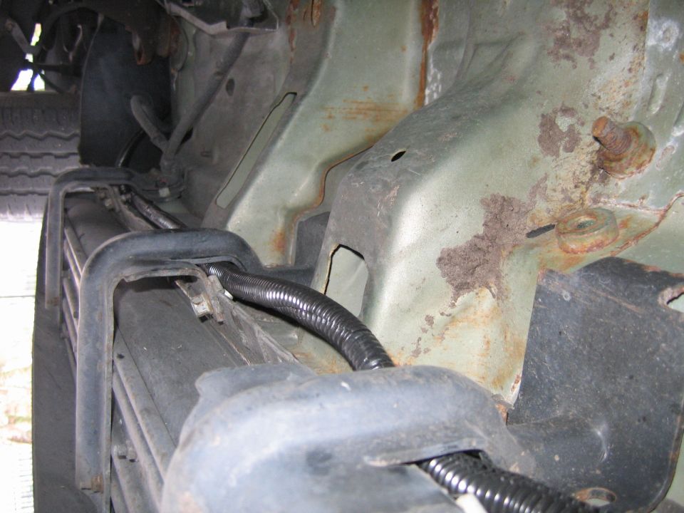 Harness Location underneath Passenger side, held in by running board mounts.