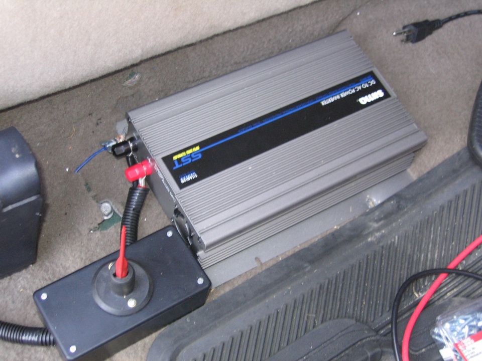 DC to AC power inverter installed on vehicle floor