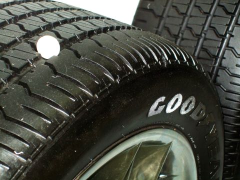 1987 Ford Bronco - Two tires are visible, one with the Goodyear logo clearly marked on its sidewall.
