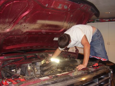 1994 Ford Bronco - Me pulling the old spark plug wires.