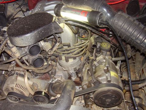 1994 Ford Bronco - Old Cap/Rotor/Wires going bye bye.