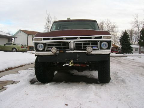 1979 Ford Bronco - Front view of a 1979 Ford Bronco equipped with a winch bumper and auxiliary lights.