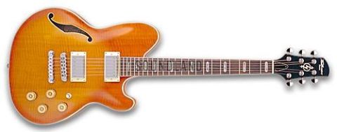 1995 Ford Bronco - Electric guitar with sunburst finish and inlaid fretboard markers.