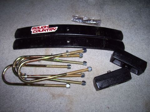 1984 Ford Bronco II - A Rough Country lift kit includes leaf springs, U-bolts, and lift blocks.