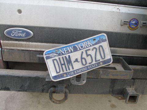 1995 Ford Bronco - Rear view of a 1995 Ford Bronco, showing the bumper and a New York license plate.