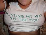 1992 Ford Mustang - A woman wears a t-shirt with text across the chest.