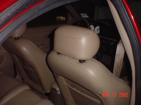 2000 Ford Contour - Interior view of car seats and dashboard. Watermark indicates photo taken in 2002.