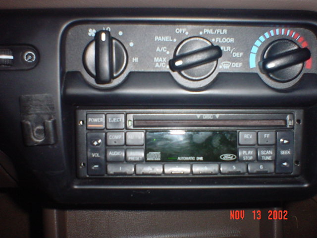 Ford center console with climate knobs and radio/cassette head unit