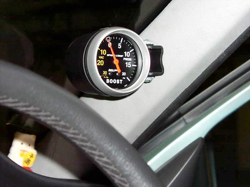 Auto Meter Sport-Comp boost gauge mounted on A-pillar above steering wheel