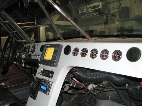 1980 Ford Bronco - Custom dashboard interior with GPS and gauges, wiring visible below.