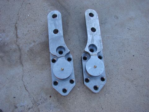 1979 Ford Bronco - Pair of custom aluminum suspension brackets, likely for off-road or performance vehicle modification.