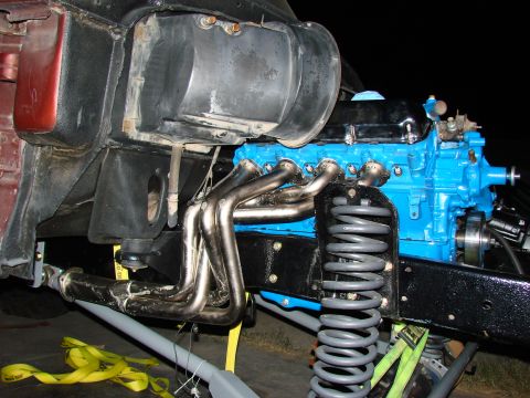 1979 Ford Bronco - Close-up view of engine and suspension components, likely during installation or repair.