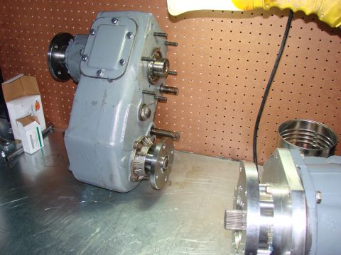 1979 Ford Bronco - Transfer case assemblies are shown on a workbench, possibly for a 4x4 vehicle.