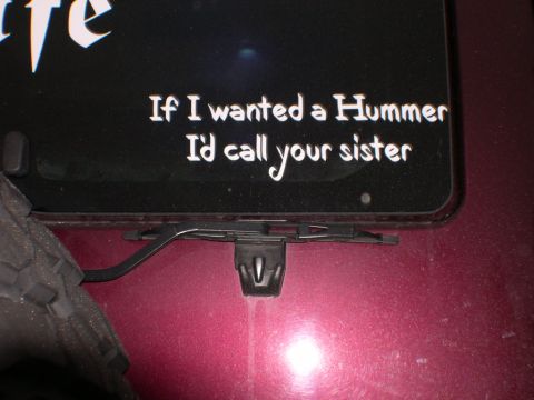 2007 Toyota FJ Cruiser - Sticker with a humorous message about Hummers is visible on a vehicle's surface.