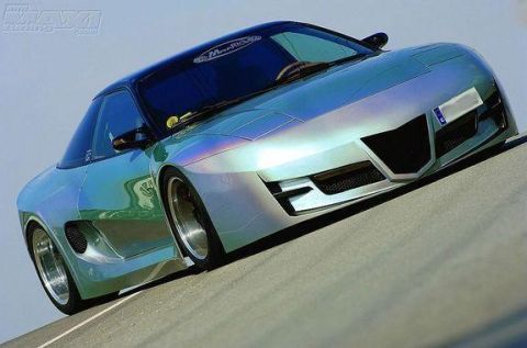1994 Ford Probe - Modified 1994 Ford Probe with a unique iridescent paint job and aggressive body kit.