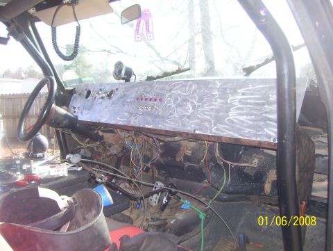 1978 Ford Bronco - Custom dashboard with exposed wiring and gauges, likely a project vehicle interior.