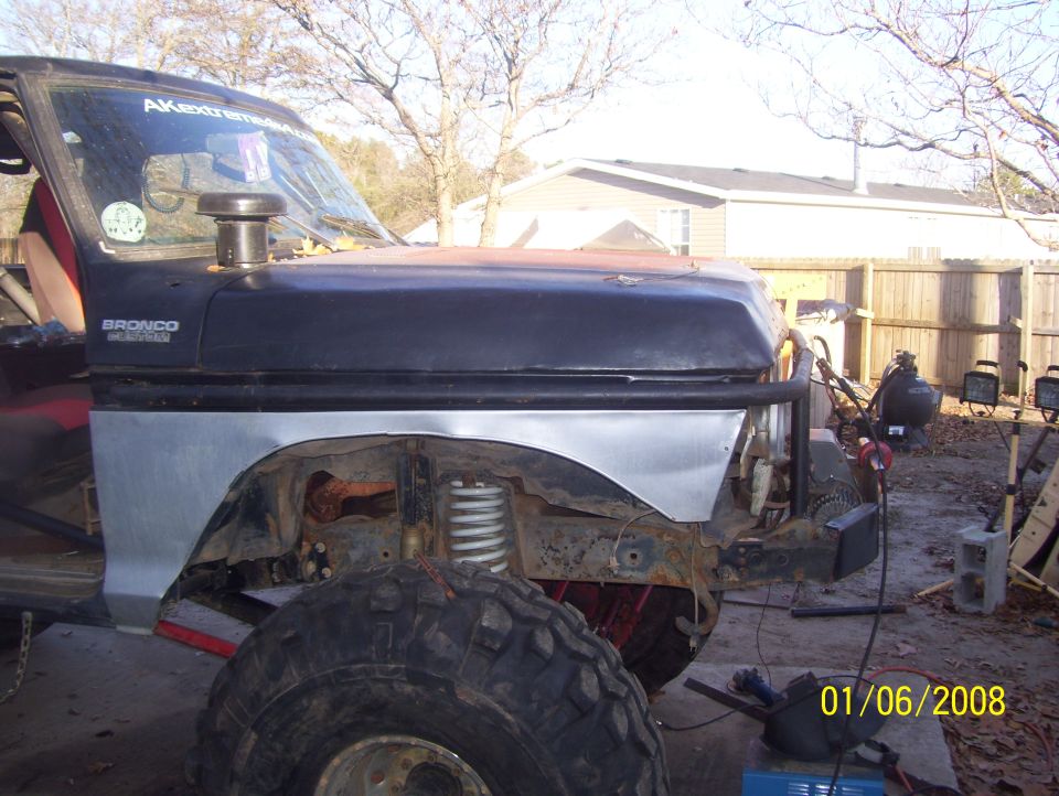 1978 Ford Bronco fender and hood with snorkel intake. Custom metal fender flare installed
