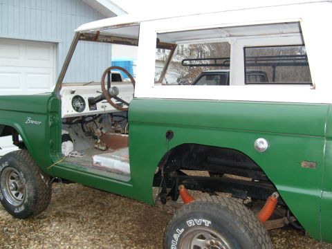 1974 Ford Bronco - Green 1974 Ford Bronco in progress, showing its interior stripped down for restoration.