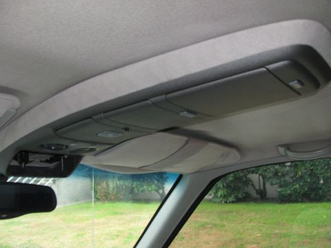 1994 Chevrolet Silverado 3500 - Interior view of a vehicle's overhead console, multiple storage compartments.