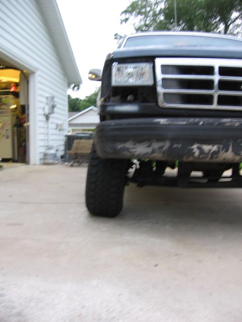 1995 Ford F-150 - Front view of a 1995 Ford F-150, showing the grille and bumper detail.