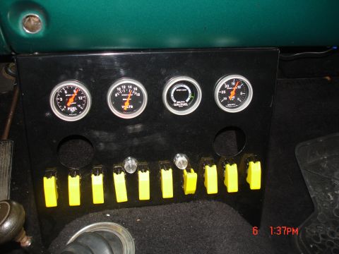 1979 Ford Bronco - Center Console with Gauges and gaurded toggles. Has vents on the sides for heat to come out Drivers side panel removable for access to wiri…