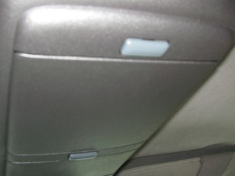 1994 Chevrolet Silverado 3500 - The interior overhead console features two lights, one of which is lit.