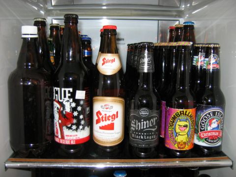1985 Ford LTD Crown Victoria - A variety of craft and imported beers are chilled and ready for consumption in this well-stocked refrigerator.
