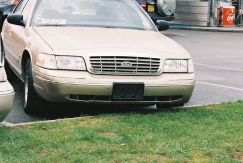 1998 Mercury Grand Marquis - Bumper damage. Pheasants explode when you hit them at 70mph! Bloomin' wildlife!