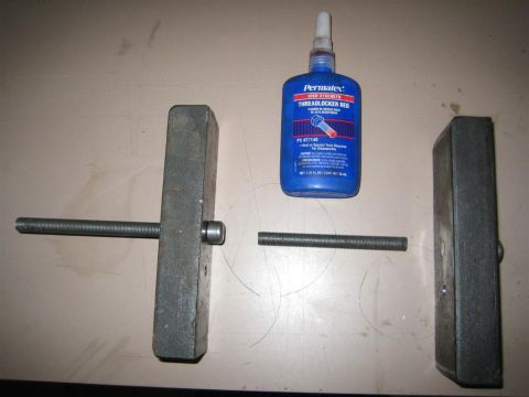 1987 Suzuki Samurai - Tools and threadlocker are laid out on a surface, possibly for automotive repair.