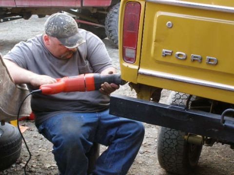 1978 Ford Bronco - Working on the rear of a 1978 Ford Bronco with a reciprocating saw.