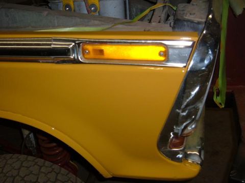 1978 Ford Bronco - Close-up of the front fender and turn signal assembly on a 1978 Ford Bronco.