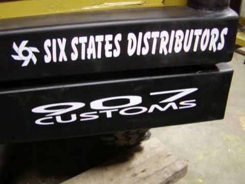 1978 Ford Bronco - Custom rear bumper features decals for 'SIX STATES DISTRIBUTORS' and '907 CUSTOMS'.