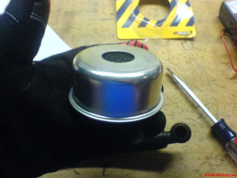 1986 Ford Bronco - new generic "stant" oil cap from advance auto parts (came w/ grommetts for breather hole)
