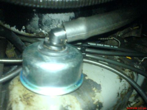 1986 Ford Bronco - installed the grommet and elbow and hose...then twisted into place. (btw, i forgot to mention i test fit the cap before installing the grom…
